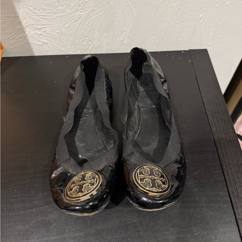 Tory Burch Black Flats with Gold Emblem